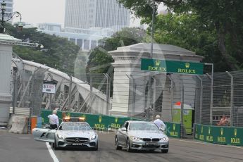 World © Octane Photographic Ltd. Charlie Whiting and Herbie Blash examining the new 12 after the new Anderson bridge layout change. Friday 18th September 2015, F1 Singapore Grand Prix Practice 1, Marina Bay. Digital Ref: 1428LB1L9627