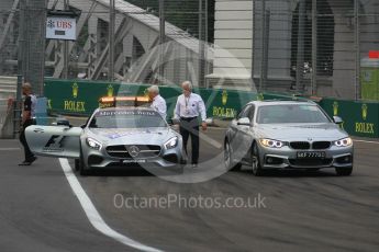 World © Octane Photographic Ltd. Charlie Whiting and Herbie Blash examining the new 12 after the new Anderson bridge layout change. Friday 18th September 2015, F1 Singapore Grand Prix Practice 1, Marina Bay. Digital Ref: 1428LB1L9633