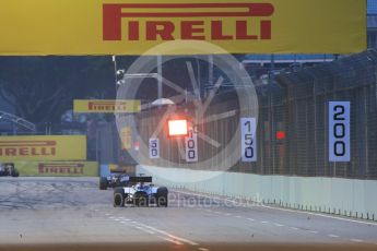 World © Octane Photographic Ltd. Mercedes AMG Petronas F1 W06 Hybrid – Lewis Hamilton goes wide causing a yellow. Saturday 19th September 2015, F1 Singapore Grand Prix Practice 3, Marina Bay. Digital Ref: 1433CB7D1631