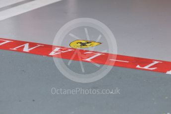 World © Octane Photographic Ltd. Scuderia Ferrari pit lane logo. Saturday 19th September 2015, F1 Singapore Grand Prix Pit lane, Marina Bay. Digital Ref: 1432CB7D1263