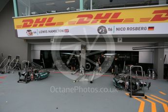 World © Octane Photographic Ltd. Mercedes AMG Petronas F1 W06 Hybrid garage. Thursday 17th September 2015, F1 Singapore Grand Prix Paddock, Marina Bay. Digital Ref:
