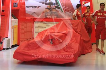 World © Octane Photographic Ltd. Scuderia Ferrari SF15-T under wraps – Sebastian Vettel. Wednesday 16th September 2015, F1 Singapore Grand Prix Set Up, Marina Bay. Digital Ref: