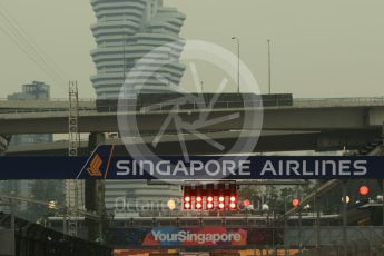 World © Octane Photographic Ltd. Red start lights and a smoggy backdrop. Wednesday 16th September 2015, F1 Singapore Grand Prix Set Up, Marina Bay. Digital Ref: 1423CB7D9549