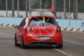 World © Octane Photographic Ltd. VW Golf GTi with clockwork key on rear window. Wednesday 16th September 2015, F1 Singapore Grand Prix Set Up, Marina Bay. Digital Ref: 1423CB7D9560