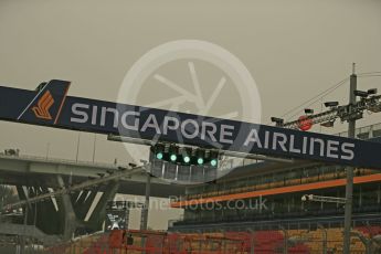 World © Octane Photographic Ltd. Smoggy start straights with the lights on green. Wednesday 16th September 2015, F1 Singapore Grand Prix Set Up, Marina Bay. Digital Ref: