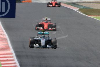 World © Octane Photographic Ltd. Mercedes AMG Petronas F1 W06 Hybrid – Nico Rosberg and Scuderia Ferrari SF15-T– Kimi Raikkonen. Sunday 10th May 2015, F1 Spanish GP Formula 1 Race, Circuit de Barcelona-Catalunya, Spain. Digital Ref: 1265CB0200