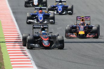 World © Octane Photographic Ltd. McLaren Honda MP4/30 – Fernando Alonso and Infiniti Red Bull Racing RB11 – Daniil Kvyat. Sunday 10th May 2015, F1 Spanish GP Formula 1 Race, Circuit de Barcelona-Catalunya, Spain. Digital Ref: 1265CB0519