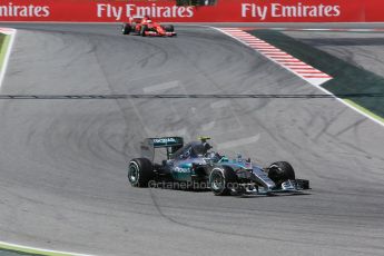 World © Octane Photographic Ltd. Mercedes AMG Petronas F1 W06 Hybrid – Nico Rosberg and Ferrari SF15-T– Sebastian Vettel. Sunday 10th May 2015, F1 Spanish GP Formula 1 Race, Circuit de Barcelona-Catalunya, Spain. Digital Ref: 1265CB5D1975