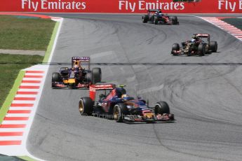 World © Octane Photographic Ltd. Scuderia Toro Rosso STR10 – Carlos Sainz Jnr and Infiniti Red Bull Racing RB11 – Daniel Ricciardo. Sunday 10th May 2015, F1 Spanish GP Formula 1 Race, Circuit de Barcelona-Catalunya, Spain. Digital Ref: 1265CB5D1990