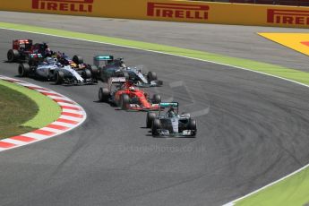 World © Octane Photographic Ltd. Mercedes AMG Petronas F1 W06 Hybrid – Nico Rosberg leads the pack. Sunday 10th May 2015, F1 Spanish GP Formula 1 Race, Circuit de Barcelona-Catalunya, Spain. Digital Ref: 1265LB1D0303