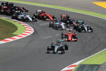 World © Octane Photographic Ltd. Mercedes AMG Petronas F1 W06 Hybrid – Nico Rosberg leads the pack. Sunday 10th May 2015, F1 Spanish GP Formula 1 Race, Circuit de Barcelona-Catalunya, Spain. Digital Ref: 1265LB1D0308