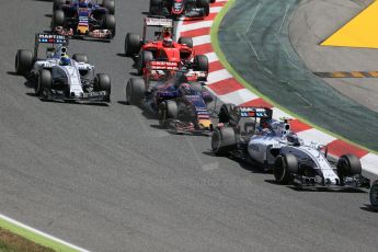 World © Octane Photographic Ltd. Williams Martini Racing FW37 – Valtteri Bottas and Scuderia Toro Rosso STR10 – Max Verstappen. Sunday 10th May 2015, F1 Spanish GP Formula 1 Race, Circuit de Barcelona-Catalunya, Spain. Digital Ref: 1265LB1D0327