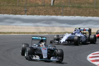 World © Octane Photographic Ltd. Mercedes AMG Petronas F1 W06 Hybrid – Lewis Hamilton and Williams Martini Racing FW37 – Valtteri Bottas. Sunday 10th May 2015, F1 Spanish GP Formula 1 Race, Circuit de Barcelona-Catalunya, Spain. Digital Ref: 1265LB1D0364