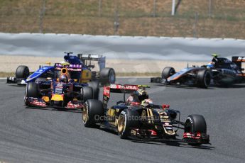 World © Octane Photographic Ltd. Lotus F1 Team E23 Hybrid – Pastor Maldonado and Infiniti Red Bull Racing RB11 – Daniil Kvyat. Sunday 10th May 2015, F1 Spanish GP Formula 1 Race, Circuit de Barcelona-Catalunya, Spain. Digital Ref: 1265LB1D0378