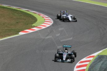 World © Octane Photographic Ltd. Mercedes AMG Petronas F1 W06 Hybrid – Lewis Hamilton and Williams Martini Racing FW37 – Valtteri Bottas. Sunday 10th May 2015, F1 Spanish GP Formula 1 Race, Circuit de Barcelona-Catalunya, Spain. Digital Ref: 1265LB1D0406