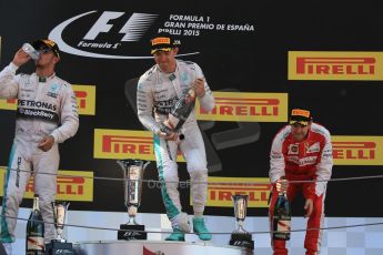 World © Octane Photographic Ltd. Mercedes AMG Petronas F1 W06 Hybrid – Nico Rosberg (1st) and Lewis Hamilton (2nd) and Scuderia Ferrari SF15-T– Sebastian Vettel (3rd). Sunday 10th May 2015, F1 Spanish GP Formula 1 Race podium, Circuit de Barcelona-Catalunya, Spain. Digital Ref: