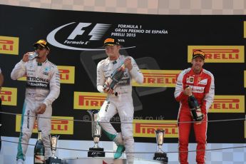 World © Octane Photographic Ltd. Mercedes AMG Petronas F1 W06 Hybrid – Nico Rosberg (1st) and Lewis Hamilton (2nd) and Scuderia Ferrari SF15-T– Sebastian Vettel (3rd). Sunday 10th May 2015, F1 Spanish GP Formula 1 Race podium, Circuit de Barcelona-Catalunya, Spain. Digital Ref: