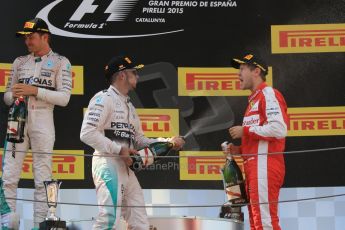 World © Octane Photographic Ltd. Mercedes AMG Petronas F1 W06 Hybrid – Nico Rosberg (1st) and Lewis Hamilton (2nd) and Scuderia Ferrari SF15-T– Sebastian Vettel (3rd). Sunday 10th May 2015, F1 Spanish GP Formula 1 Race podium, Circuit de Barcelona-Catalunya, Spain. Digital Ref: