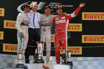 World © Octane Photographic Ltd. Mercedes AMG Petronas F1 W06 Hybrid – Nico Rosberg (1st) and Lewis Hamilton (2nd) and Scuderia Ferrari SF15-T– Sebastian Vettel (3rd). Sunday 10th May 2015, F1 Spanish GP Formula 1 Race podium, Circuit de Barcelona-Catalunya, Spain. Digital Ref: