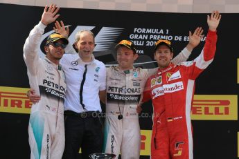 World © Octane Photographic Ltd. Mercedes AMG Petronas F1 W06 Hybrid – Nico Rosberg (1st) and Lewis Hamilton (2nd) and Scuderia Ferrari SF15-T– Sebastian Vettel (3rd). Sunday 10th May 2015, F1 Spanish GP Formula 1 Race podium, Circuit de Barcelona-Catalunya, Spain. Digital Ref: