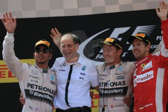 World © Octane Photographic Ltd. Mercedes AMG Petronas F1 W06 Hybrid – Nico Rosberg (1st) and Lewis Hamilton (2nd) and Scuderia Ferrari SF15-T– Sebastian Vettel (3rd). Sunday 10th May 2015, F1 Spanish GP Formula 1 Race podium, Circuit de Barcelona-Catalunya, Spain. Digital Ref: