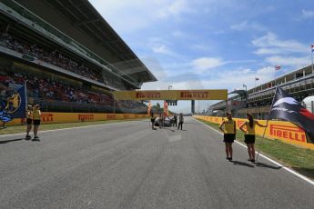 World © Octane Photographic Ltd. Grid girls with F1 and FIA Flags. Sunday 10th May 2015, F1 Spanish GP Formula 1 Grid, Circuit de Barcelona-Catalunya, Spain. Digital Ref: 1264LB1D0123