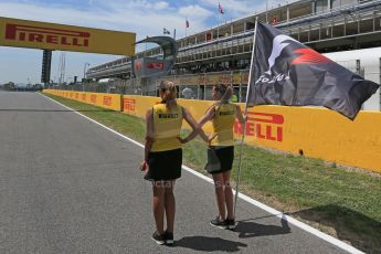 World © Octane Photographic Ltd. Grid girls with F1 Flag. Sunday 10th May 2015, F1 Spanish GP Formula 1 Grid, Circuit de Barcelona-Catalunya, Spain. Digital Ref: 1264LB1D0131