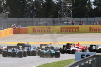 World © Octane Photographic Ltd. Saturday 9th May 2015. The pack safely bunches into turn 1. GP2 Race 1 – Circuit de Barcelona–Catalunya. Spain. Digital Ref: