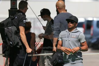 World © Octane Photographic Ltd. Mercedes AMG Petronas F1 W06 Hybrid – Lewis Hamilton enters with the paddock with his brother Nic Hamilton. Thursday 7th May 2015, F1 Spanish GP Paddock, Circuit de Barcelona-Catalunya, Spain. Digital Ref: 1244LB1D5479