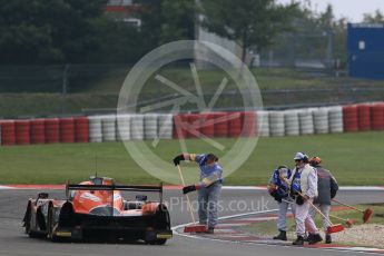 World © Octane Photographic Ltd. FIA World Endurance Championship (WEC), 6 Hours of Nurburgring , Germany - Practice 3, Saturday 29th August 2015. G-Drive Racing – Nissan Ligier JS P2 – LMP2 – Roman Rusinov, Julien Canal and Sam Bird pass marshals clearing gravel from the track. Digital Ref : 1395LB1D5363