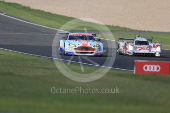 World © Octane Photographic Ltd. FIA World Endurance Championship (WEC), 6 Hours of Nurburgring , Germany - Practice 3, Saturday 29th August 2015. Aston Martin Racing – Aston Martin Vantage V8 - LMGTE Pro – Marco Sorensen and Christoffer Nygaard and Rebellion Racing – Rebellion R-One - LMP1 - Nicolas Prost, Nick Heidfeld and Mathias Beche. Digital Ref : 1395LB1D5630