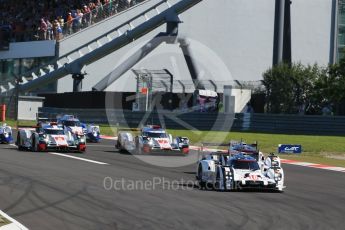 World © Octane Photographic Ltd. FIA World Endurance Championship (WEC), 6 Hours of Nurburgring , Germany - Race, Sunday 30th August 2015. The Porsche Team – Porsche 919 Hybrids - LM LMP1 of Romain Dumas, Neel Jani and Marc Lieb and Timo Bernhard, Mark Webber and Brendon Hartley ahead of the Audi Sport Team Joest- Audi R18 e-tron Quatrros of Andre Lotterer, Benoit Treluyer and Marcel Fassler and Oliver Jarvis, Lucas di Grassi and Loic Duval. Digital Ref : 1398LB1D6309