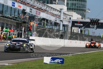World © Octane Photographic Ltd. FIA World Endurance Championship (WEC), 6 Hours of Nurburgring , Germany - Race, Sunday 30th August 2015. Abu Dhabi-Proton Racing – Porsche 911 RSR - LMGTE Am – Christian Ried, Earl Bamber and Khaled Al Qubaisi and G-Drive Racing – Nissan Ligier JS P2 – LMP2 – Roman Rusinov, Julien Canal and Sam Bird. Digital Ref : 1398LB1D7104