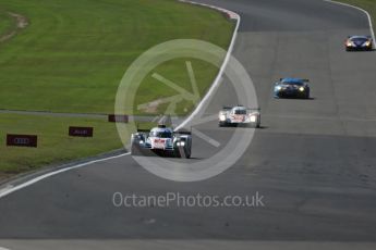 World © Octane Photographic Ltd. FIA World Endurance Championship (WEC), 6 Hours of Nurburgring , Germany - Race, Sunday 30th August 2015. Audi Sport Team Joest- Audi R18 e-tron Quatrro - LMP1 - Andre Lotterer, Benoit Treluyer and Marcel Fassler and Rebellion Racing – Rebellion R-One - LMP1 - Nicolas Prost, Nick Heidfeld and Mathias Beche. Digital Ref : 1398LB1D7341