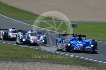 World © Octane Photographic Ltd. FIA World Endurance Championship (WEC), 6 Hours of Nurburgring , Germany - Race, Sunday 30th August 2015. Signatech Alpine – Alpine A450b - LMP2 - Nelson Panciatici, Paul-Loup Chatin and Vincent Capillaire, Toyota Racing – Toyota TS040 Hybrid - LMP1 - Anthony Davidson, Sebastien Buemi and Kazuki Nakajima and Audi Sport Team Joest- Audi R18 e-tron Quatrro - LMP1 - Andre Lotterer, Benoit Treluyer and Marcel Fassler. Digital Ref : 1398LB1D7410