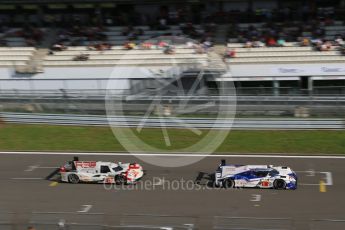 World © Octane Photographic Ltd. FIA World Endurance Championship (WEC), 6 Hours of Nurburgring , Germany - Race, Sunday 30th August 2015. Toyota Racing – Toyota TS040 Hybrid - LMP1 - Anthony Davidson, Sebastien Buemi and Kazuki Nakajima and Rebellion Racing – Rebellion R-One - LMP1 - Nicolas Prost, Nick Heidfeld and Mathias Beche. Digital Ref : 1398LB1D8005