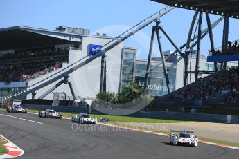 World © Octane Photographic Ltd. FIA World Endurance Championship (WEC), 6 Hours of Nurburgring , Germany - Race, Sunday 30th August 2015. The Porsche Team – Porsche 919 Hybrids - LM LMP1 of Romain Dumas, Neel Jani and Marc Lieb and Timo Bernhard, Mark Webber and Brendon Hartley ahead of the Audi Sport Team Joest- Audi R18 e-tron Quatrros of Andre Lotterer, Benoit Treluyer and Marcel Fassler and Oliver Jarvis, Lucas di Grassi and Loic Duval. Digital Ref : 1398LB5D1173