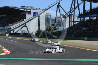 World © Octane Photographic Ltd. FIA World Endurance Championship (WEC), 6 Hours of Nurburgring , Germany - Race, Sunday 30th August 2015. The Porsche Team – Porsche 919 Hybrids - LM LMP1 of Romain Dumas, Neel Jani and Marc Lieb and Timo Bernhard, Mark Webber and Brendon Hartley ahead of the Audi Sport Team Joest- Audi R18 e-tron Quatrros of Andre Lotterer, Benoit Treluyer and Marcel Fassler and Oliver Jarvis, Lucas di Grassi and Loic Duval. Digital Ref : 1398LB5D1175