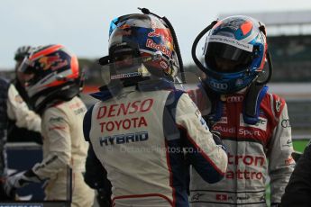 World © Octane Photographic Ltd. FIA World Endurance Championship (WEC), 6 Hours of Silverstone Race - Podium, UK, Sunday 12th April 2015. 1st Place, Audi R18 e-tron quattro - Marcel FASSLER, 3rd Place, Toyota TS040 Hybrid, Sebastien BUEMI. Digital Ref : 1227LW1L1938