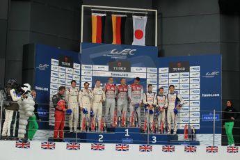 World © Octane Photographic Ltd. FIA World Endurance Championship (WEC), 6 Hours of Silverstone Race - Podium, UK, Sunday 12th April 2015. 1st Place, Audi R18 e-tron quattro - Marcel FASSLER, André LOTTERER, Benoit TRELUYER. 2nd Place, Porsche 919 Hybrid - Romain DUMAS, Neel JANI, Marc LIEB 3rd Place, Toyota TS040 Hybrid, Anthony DAVIDSON, Sebastien BUEMI, Kazuki NAKAJIMA. Digital Ref : 1227LW1L1966
