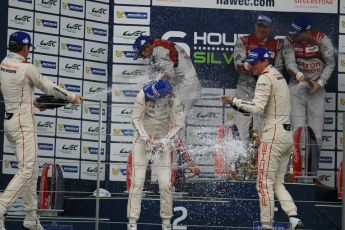 World © Octane Photographic Ltd. FIA World Endurance Championship (WEC), 6 Hours of Silverstone Race - Podium, UK, Sunday 12th April 2015. 1st Place, Audi R18 e-tron quattro - Marcel FASSLER, Andre LOTTERER, Benoît TRELUYER. 2nd Place, Porsche 919 Hybrid - Romain DUMAS, Neel JANI, Marc LIEB 3rd Place, Toyota TS040 Hybrid, Anthony DAVIDSON, Sebastien BUEMI, Kazuki NAKAJIMA. Digital Ref : 1227LW1L2025