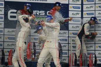 World © Octane Photographic Ltd. FIA World Endurance Championship (WEC), 6 Hours of Silverstone Race - Podium, UK, Sunday 12th April 2015. 1st Place, Audi R18 e-tron quattro - Marcel FASSLER, Andre LOTTERER, Benoit TRELUYER. 2nd Place, Porsche 919 Hybrid - Romain DUMAS, Neel JANI, Marc LIEB 3rd Place, Toyota TS040 Hybrid, Anthony DAVIDSON, Sebastien BUEMI, Kazuki NAKAJIMA. Digital Ref : 1227LW1L2040