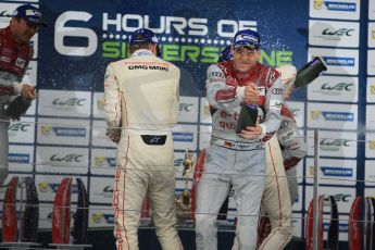 World © Octane Photographic Ltd. FIA World Endurance Championship (WEC), 6 Hours of Silverstone Race - Podium, UK, Sunday 12th April 2015. 1st Place, Audi R18 e-tron quattro - Marcel FASSLER, Andre LOTTERER, Benoit TRELUYER. 2nd Place, Porsche 919 Hybrid - Romain DUMAS, Neel JANI, Marc LIEB 3rd Place, Toyota TS040 Hybrid, Anthony DAVIDSON, Sebastien BUEMI, Kazuki NAKAJIMA. Digital Ref : 1227LW1L2074