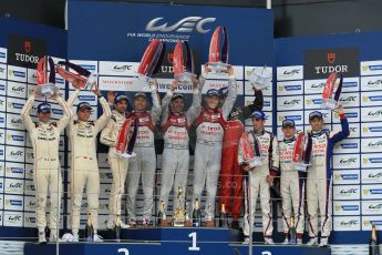 World © Octane Photographic Ltd. FIA World Endurance Championship (WEC), 6 Hours of Silverstone Race - Podium, UK, Sunday 12th April 2015. 1st Place, Audi R18 e-tron quattro - Marcel FASSLER, Andre LOTTERER, Benoit TRELUYER. 2nd Place, Porsche 919 Hybrid - Romain DUMAS, Neel JANI, Marc LIEB 3rd Place, Toyota TS040 Hybrid, Anthony DAVIDSON, Sebastien BUEMI, Kazuki NAKAJIMA. Digital Ref : 1227LW1L2091