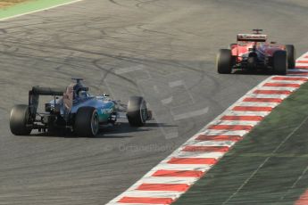 World © Octane Photographic Ltd. Scuderia Ferrari SF15-T – Kimi Raikkonen and Mercedes AMG Petronas F1 W06 Hybrid – Nico Rosberg. Friday 20th February 2015, F1 Winter testing, Circuit de Barcelona Catalunya, Spain, Day 2. Digital Ref : 1188CB1L6332