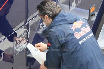 World © Octane Photographic Ltd. Scuderia Toro Rosso Estrella Galicia sponsor logo being applied to a race transporter. Saturday 21st February 2015, F1 Winter testing, Circuit de Barcelona Catalunya, Spain, Day 3. Digital Ref: 1190CB1L6849