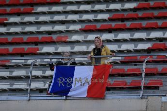World © Octane Photographic Ltd. Lotus F1 Team – Romain Grosjean fans in the grandstand. Thursday 26th February 2015, F1 Winter test #3, Circuit de Barcelona-Catalunya, Spain Test 2 Day 1. Digital Ref : 1192LB1D0402