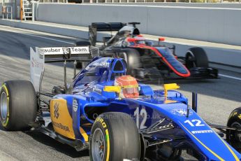 World © Octane Photographic Ltd. Sauber F1 Team C34-Ferrari – Felipe Nasr and McLaren Honda MP4/30 – Jenson Button. Friday 27th February 2015, F1 Winter test #3, Circuit de Barcelona-Catalunya, Spain Test 2 Day 2. Digital Ref: 1193CB1L1793