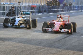 World © Octane Photographic Ltd. Scuderia Ferrari SF-15T – Sebastian Vettel and Mercedes AMG Petronas F1 W06 Hybrid – Lewis Hamilton. Monday 2nd February 2015, Formula 1 Winter testing, Jerez de la Frontera, Spain. Digital Ref : 1182CB1D1605