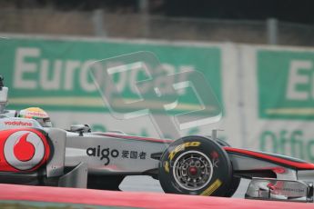 © Octane Photographic 2011. Formula 1 testing Sunday 20th February 2011 Circuit de Catalunya. McLaren MP4/26 - Lewis Hamilton. Digital ref : 0010CB1D1401
